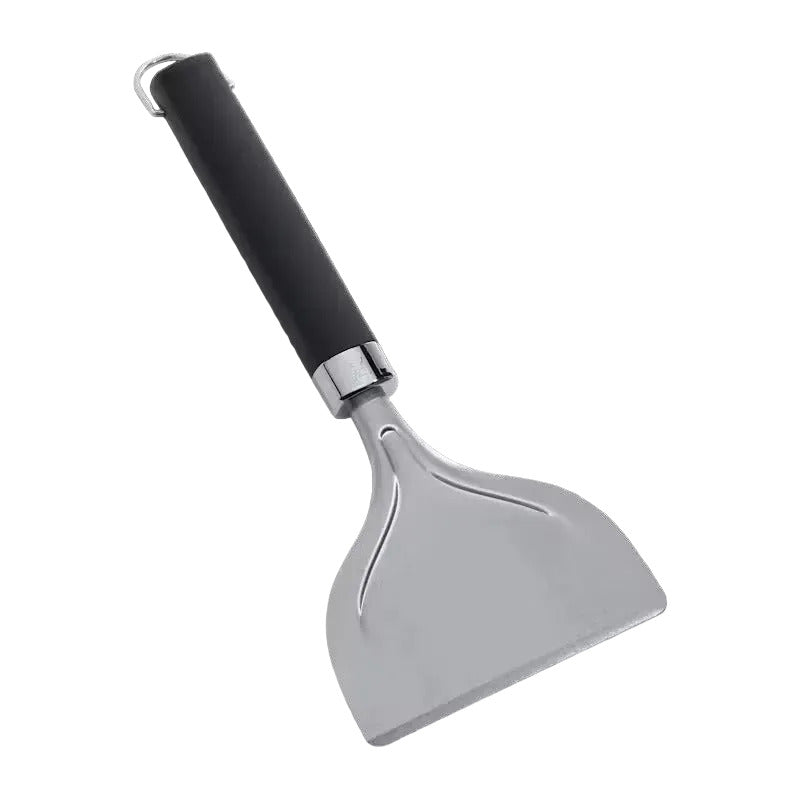 Metal spatula with black handle on a white background