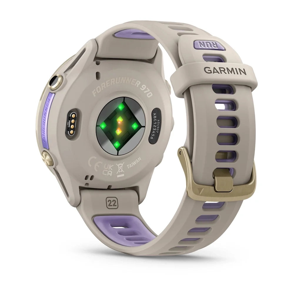 Garmin Forerunner® 970 Soft Gold Titanium with French Grey Case and French Grey/Translucent Indigo Band GARMIN