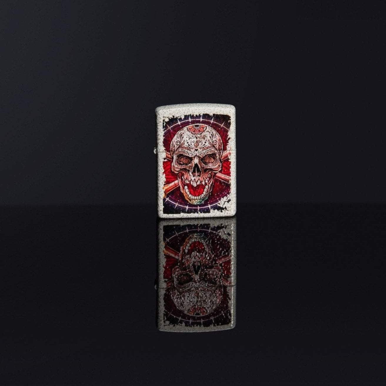 Lifestyle image of Skull Design Mercury Glass Windproof Lighter standing in a black background, with its design reflecting on the group.