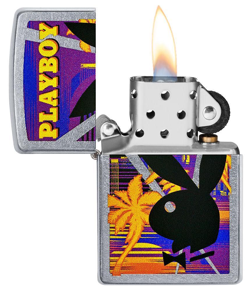 Playboy Beach Rabbit Head Street Chrome?äó Windproof Lighter with its lid open and lit.